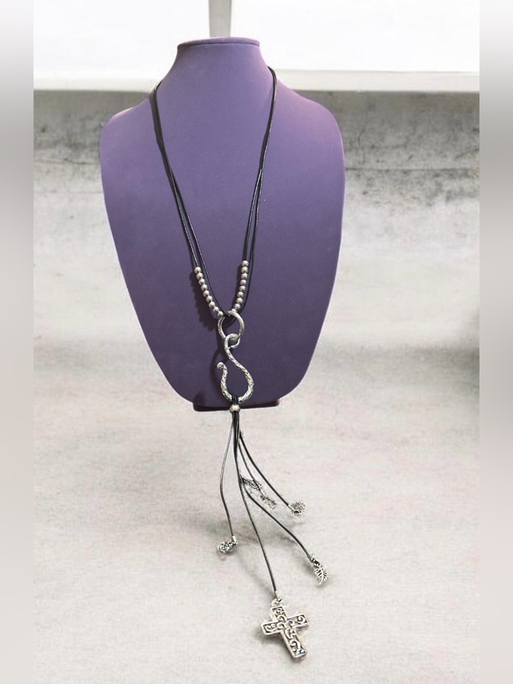 Long Black Leather Tassel Necklace with Silver Accents
953